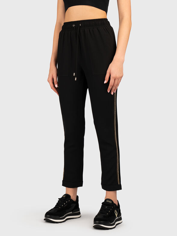 Sports trousers with rhinestones - 0