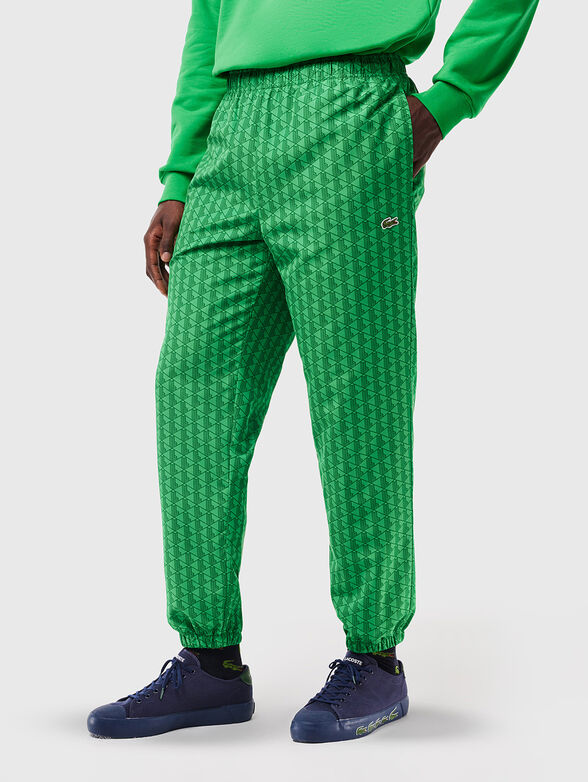 Sports trousers with monogram print - 1