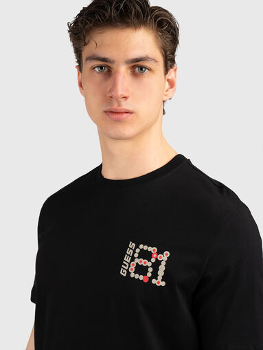 T-shirt with a statement print on the back - 4