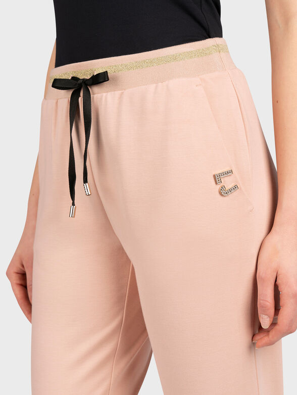 Black sports trousers with shiny logo accent - 3