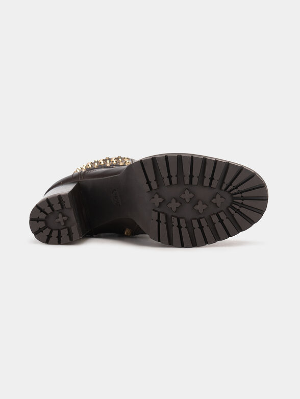 Leather boots accented with appliqued eyelets - 5