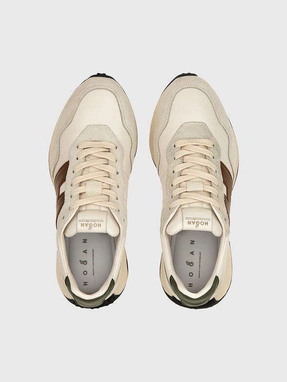 Leather sneakers with a contrasting logo - 6