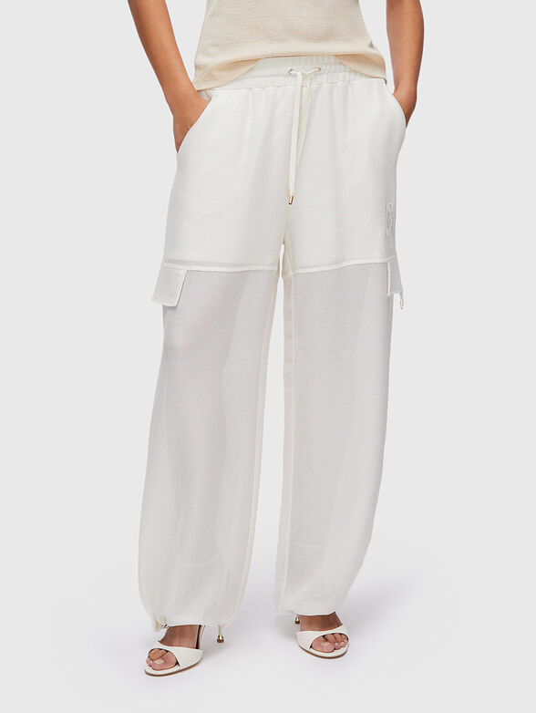 Cargo pants with a mesh texture - 1