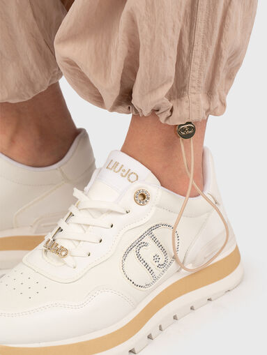 Trousers with high waist and elastic - 5