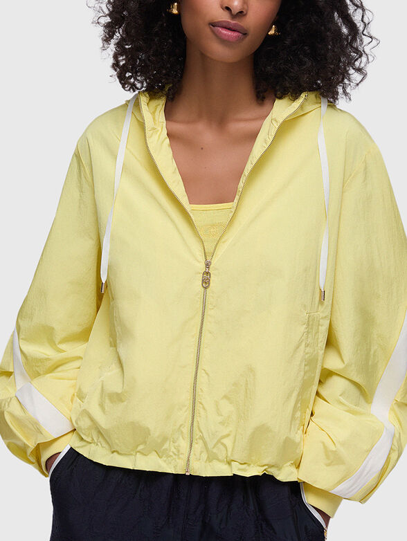 Packable jacket with hood - 1