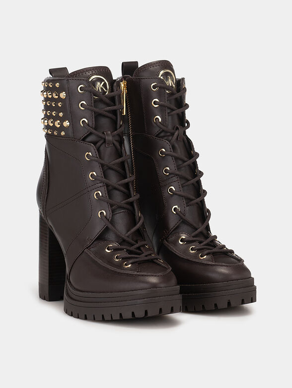 Leather boots accented with appliqued eyelets - 2