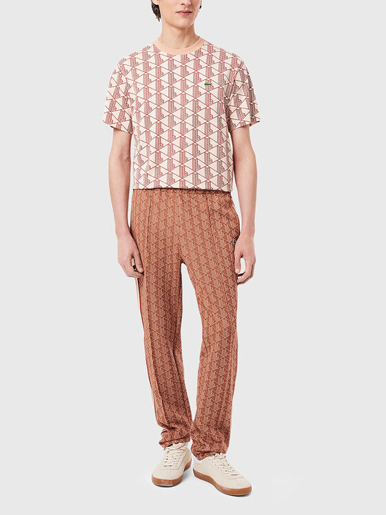 Brown sports trouser with monogram print - 1