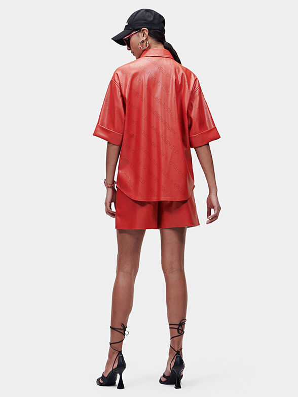 Black faux leather shirt with perforated logos - 2