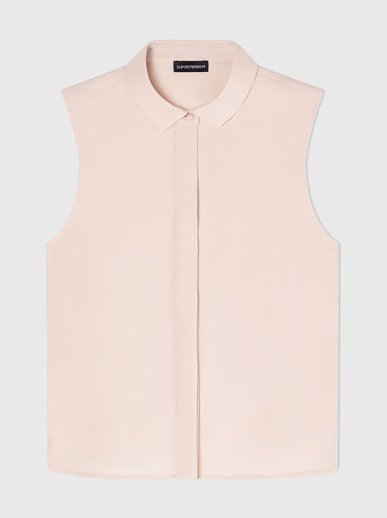 Sleeveless shirt with a hidden fastening - 1