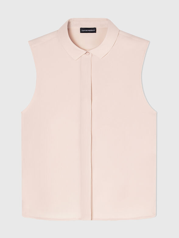 Sleeveless shirt with a hidden fastening - 1