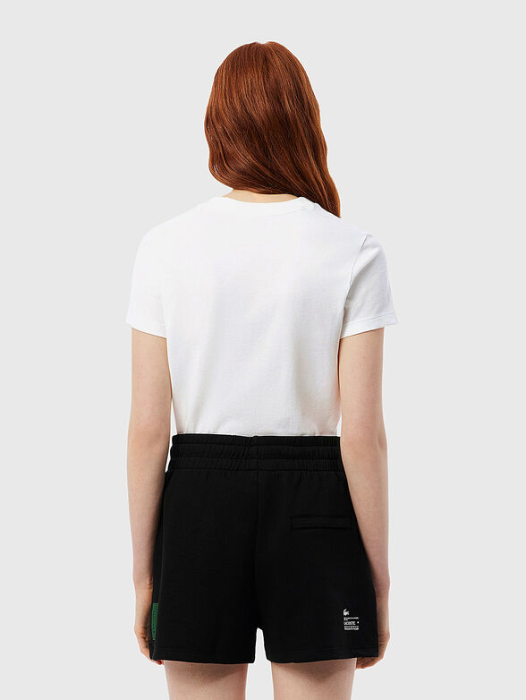 T-shirt is pink color with logo - 3