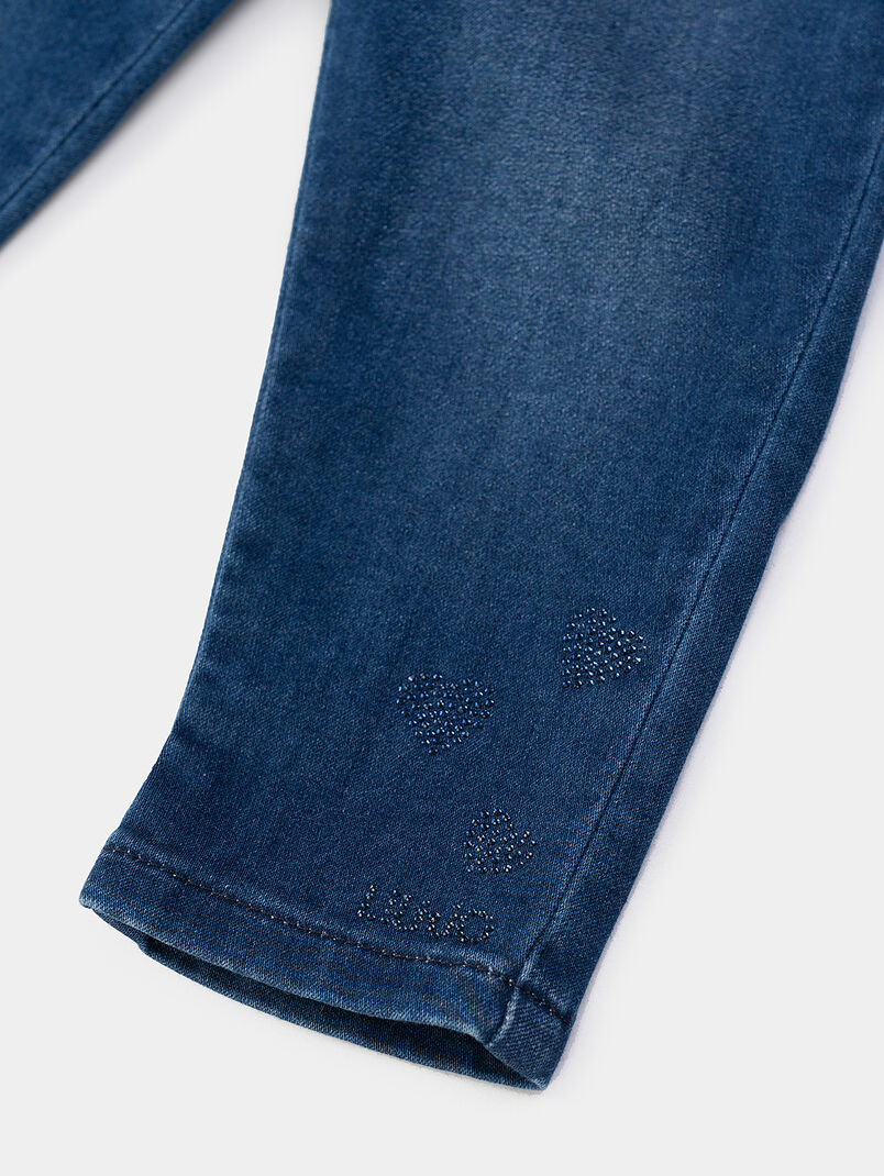 Blue jeans with applied rhinestones - 3