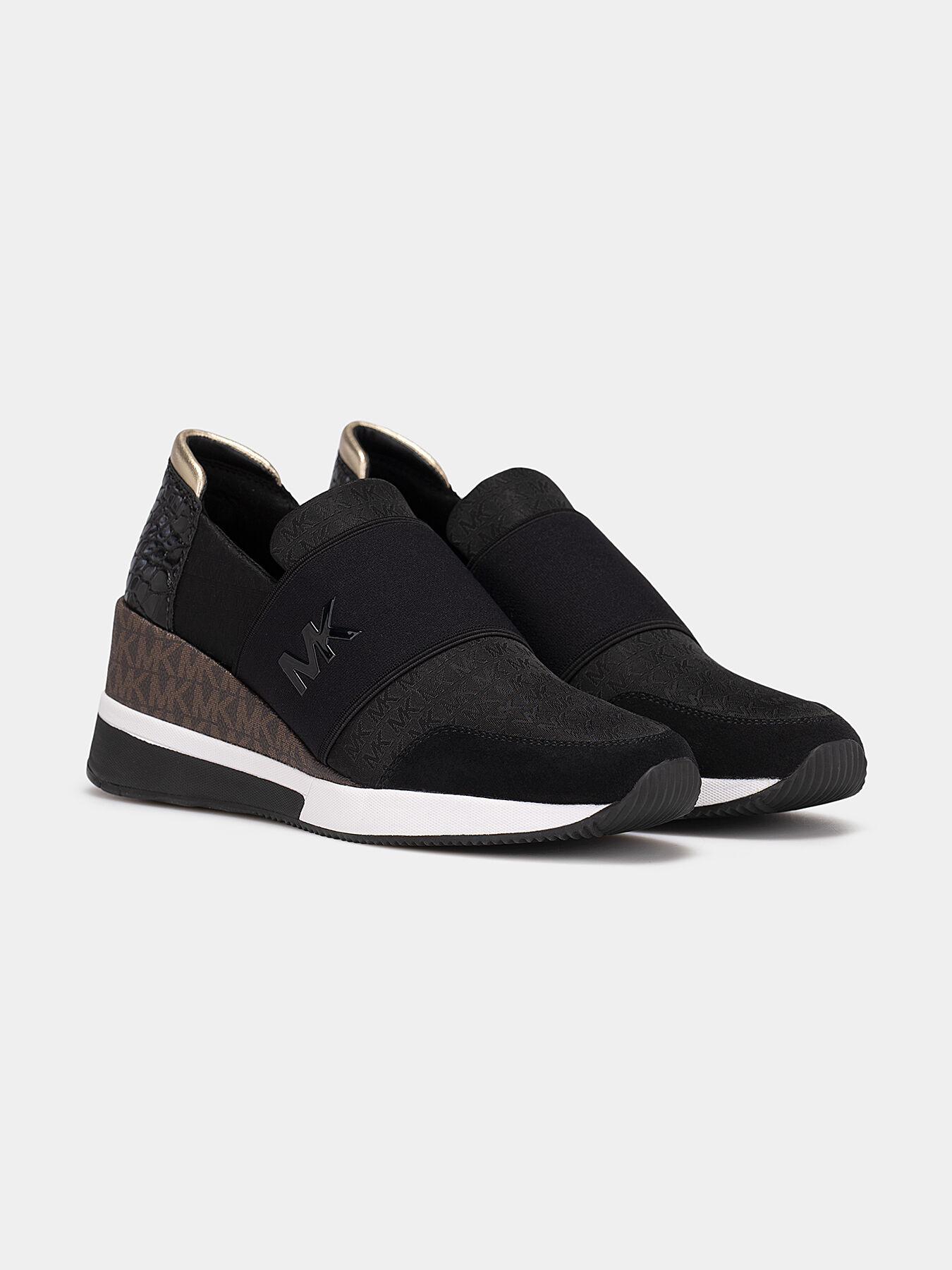 Michael kors felix on sale slip on sneakers