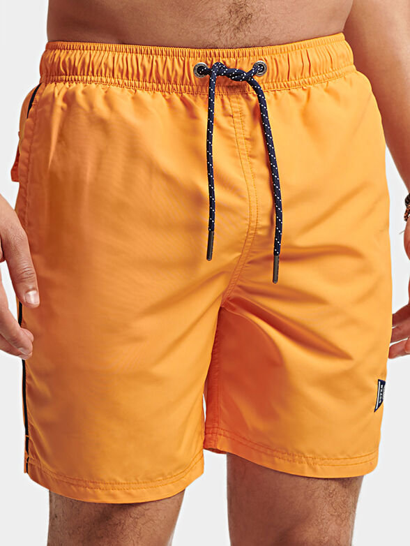 Blue beach shorts - 1