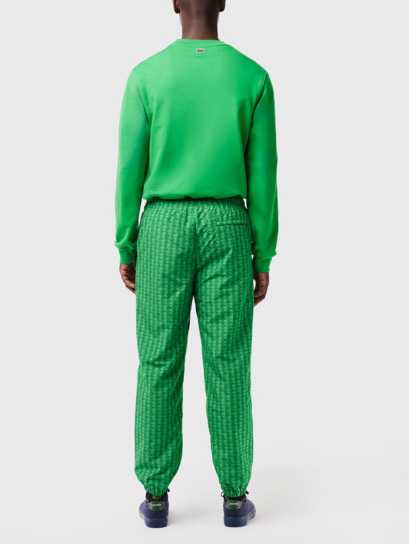 Sports trousers with monogram print - 2