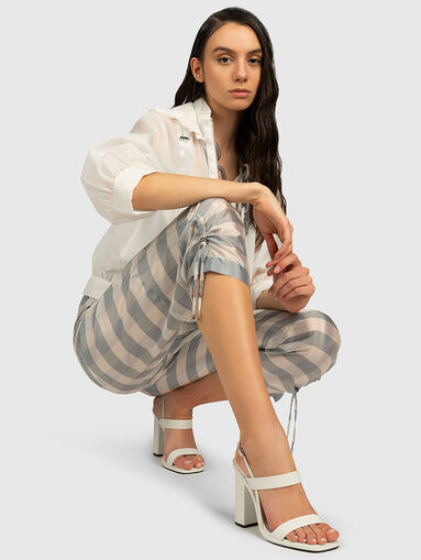 Pants with a checkered print - 5