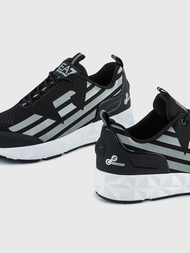 Black sneakers with gold accents - 4