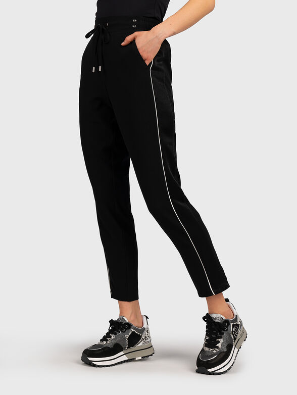 Black sports pants with shiny accent - 1
