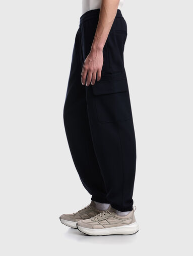 Dark blue trousers with a textured pattern - 3