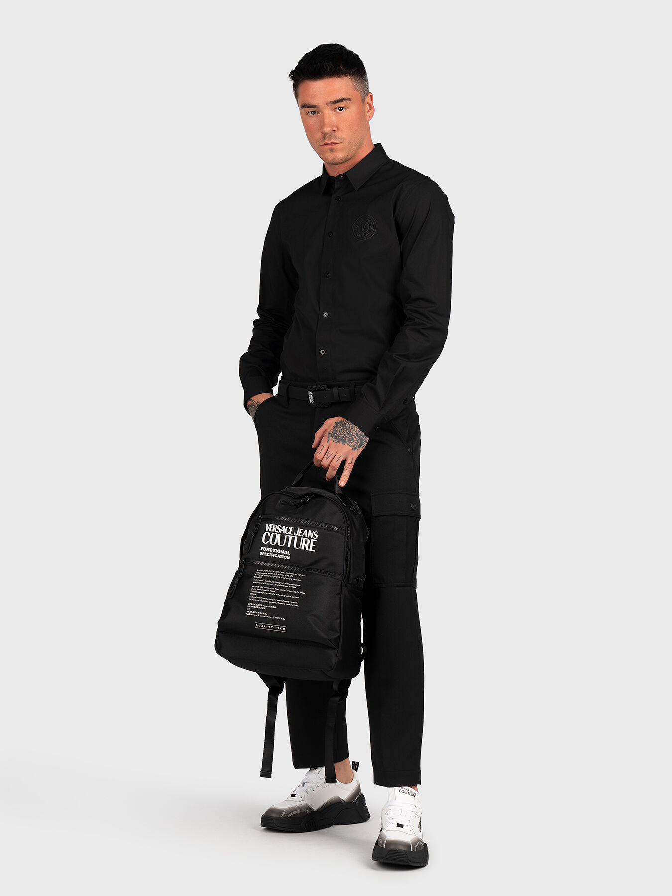 Black cargo pants with logo patch brand VERSACE JEANS COUTURE —  Globalbrandsstore.com/en