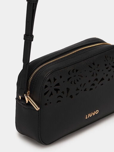 Black crossbody bag with laser perforations - 5