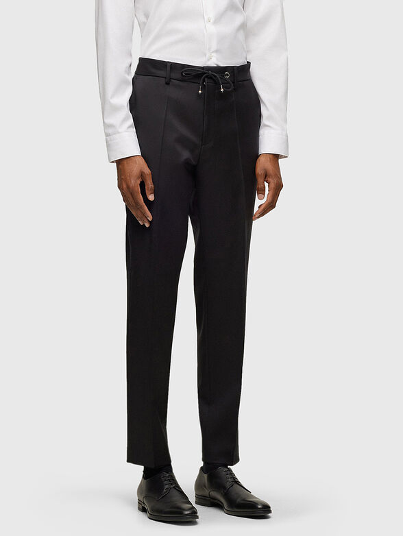 Wool trousers in black colour - 1