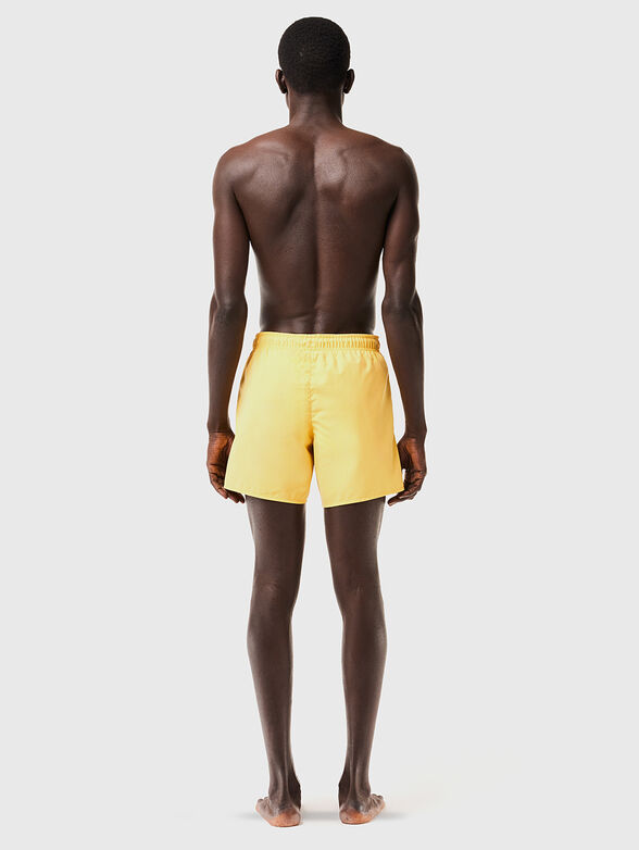 Yellow shorts with logo detail - 2