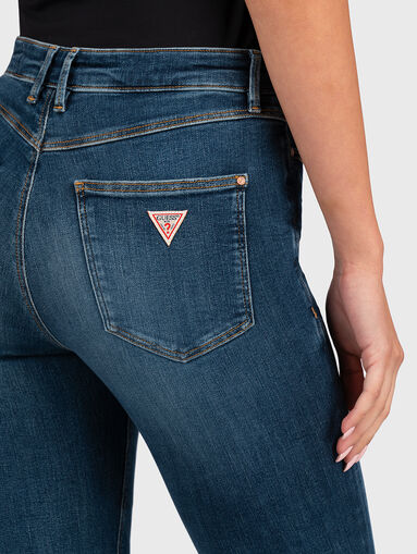 Jeans in blue color with logo patch - 4