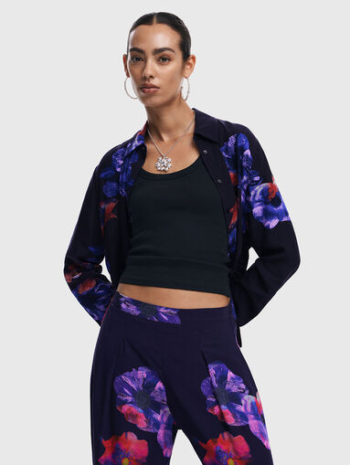 Trousers with floral accents - 4