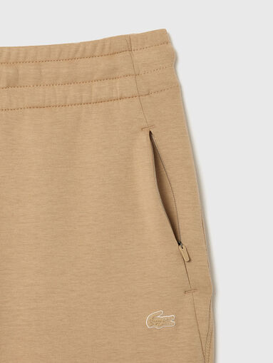 Beige sweatpants with logo details - 4