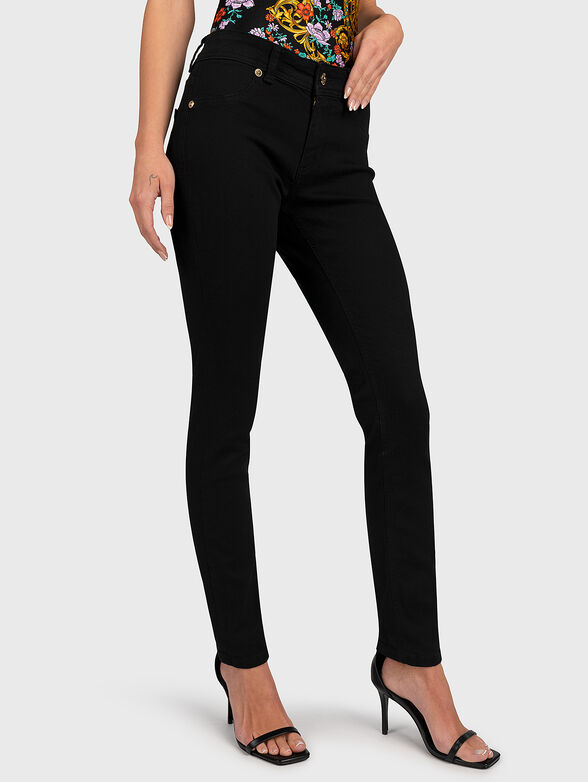 Black jeans with golden logo embroidery - 1