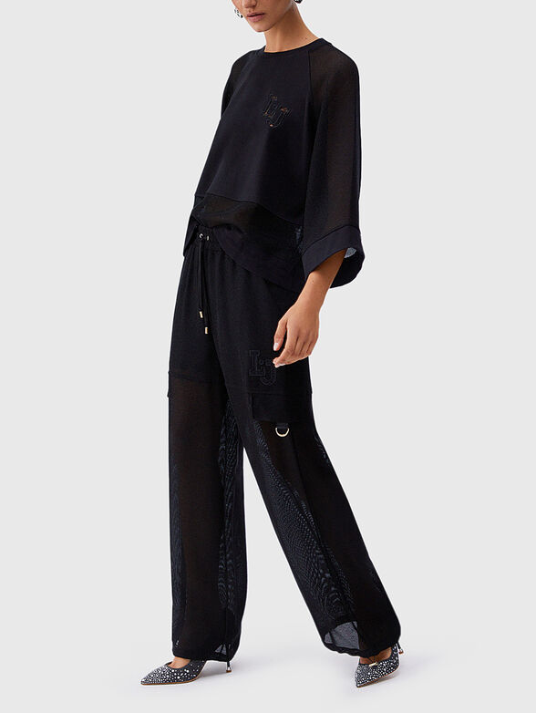 Cargo pants with a mesh texture - 4