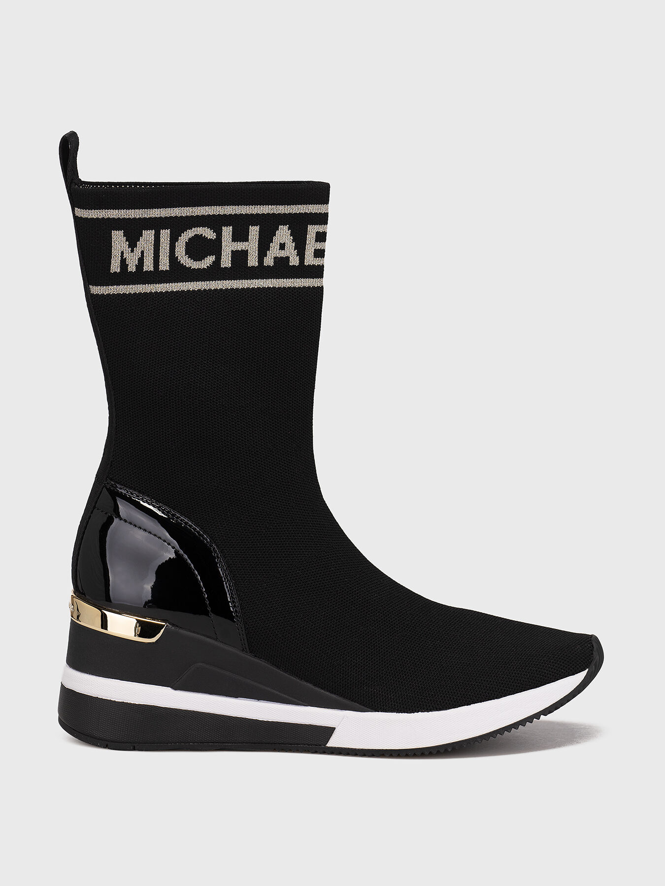 SKYLER slip on boots with logo detail brand MICHAEL KORS Globalbrandsstore en