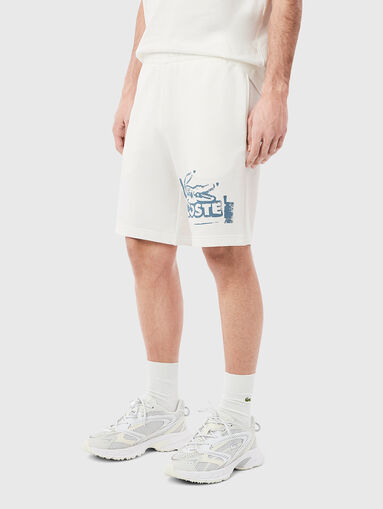 Cotton shorts with logo print in ecru - 3
