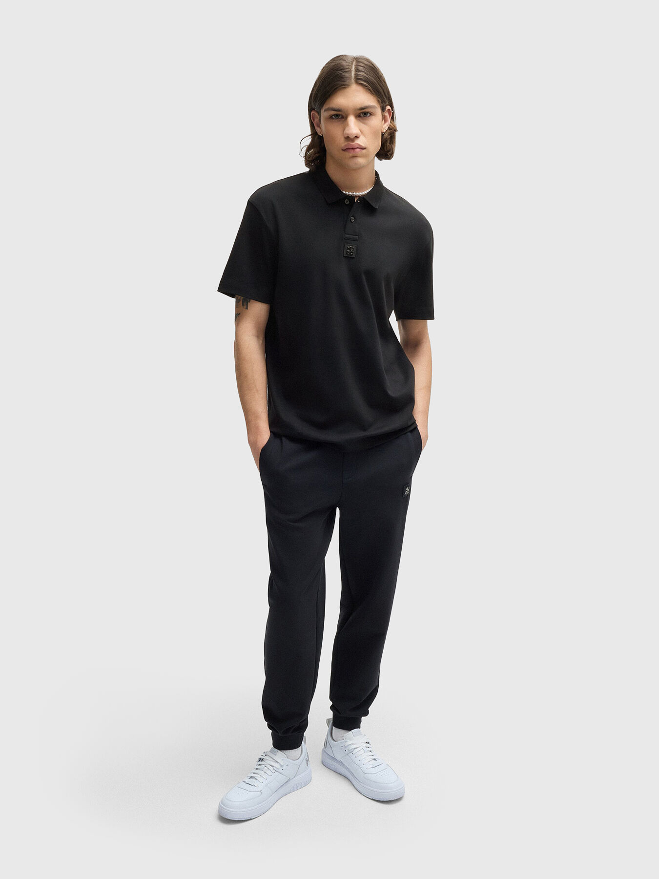 DEABONO polo shirt in black brand HUGO — Globalbrandsstore