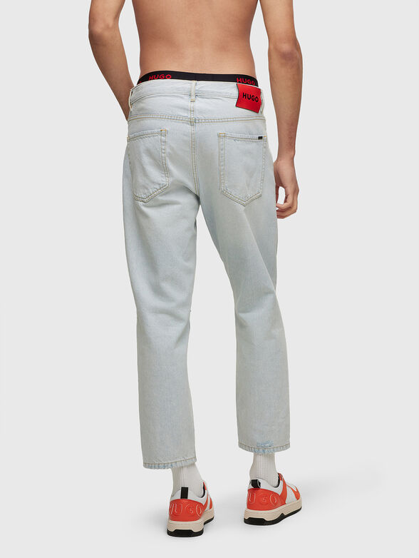 Light blue jeans with distressed effect - 2