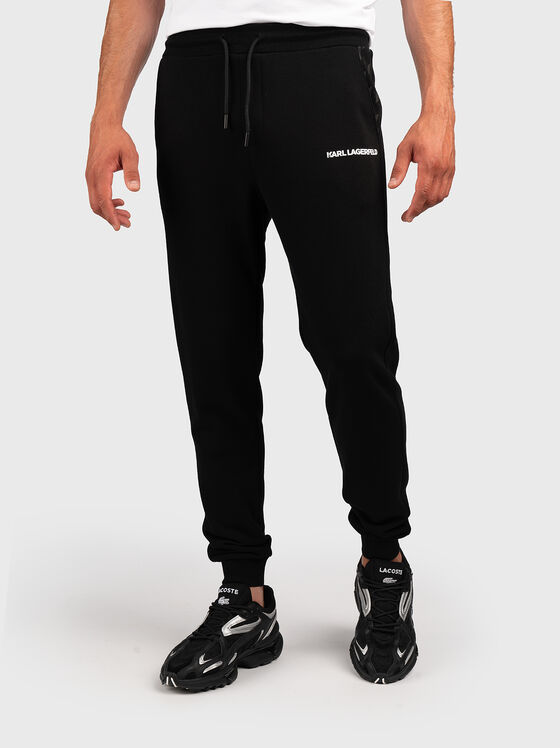 Black sports trousers with contrast logo - 1
