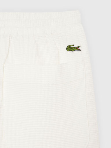 Sports shorts with logo detail - 4
