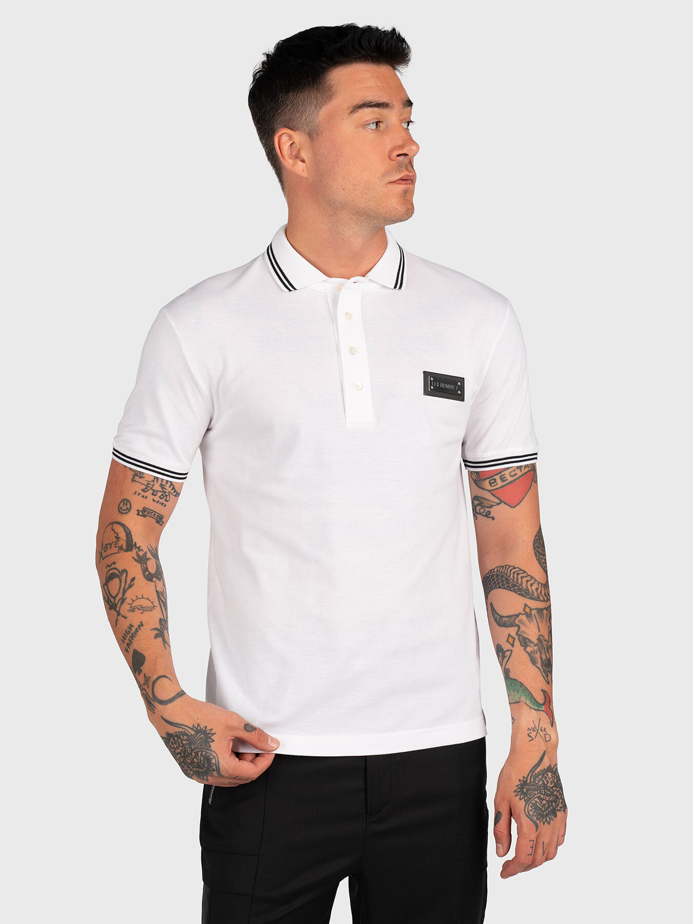 Black cotton polo shirt with logo patch brand LES HOMMES