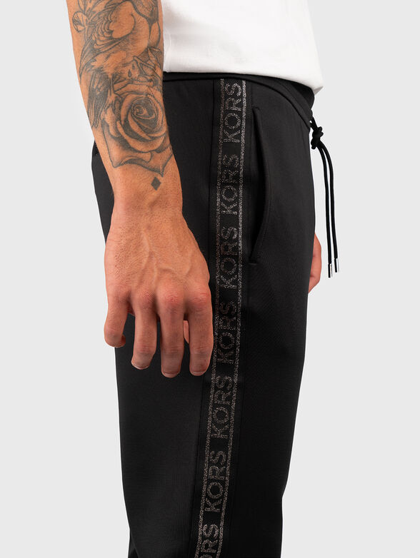Sports trousers with logo edge - 4