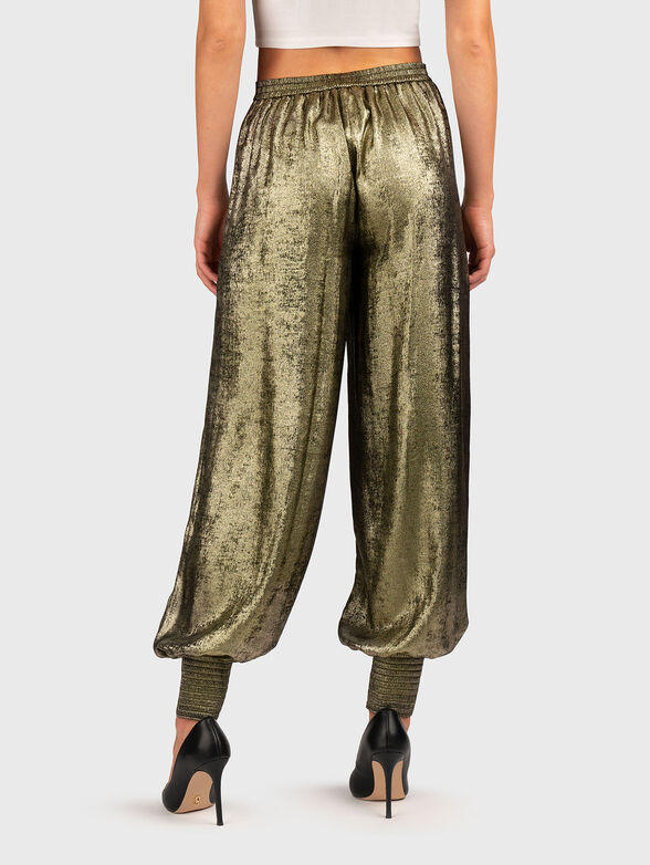 Golden trousers with wide legs - 2