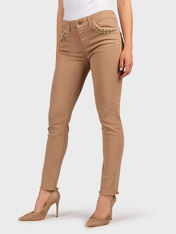 Beige jeans with accents on the pockets - 1