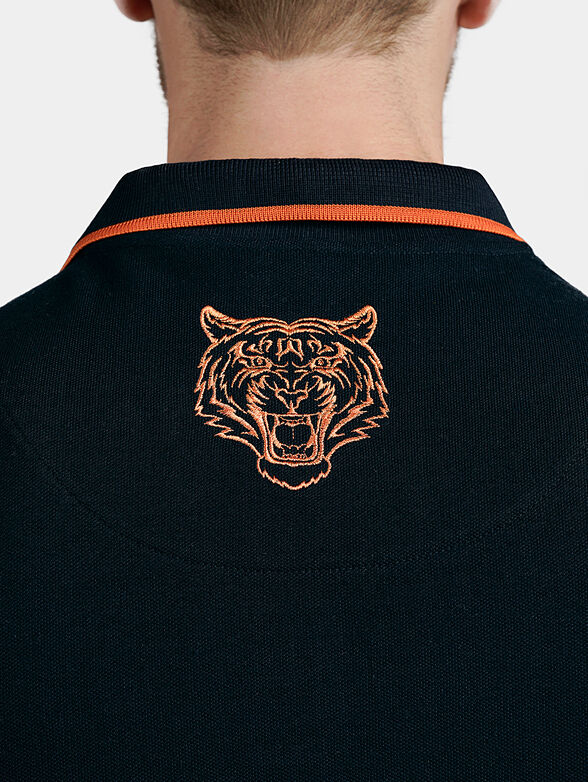 Dark blue polo-shirt with orange details - 3