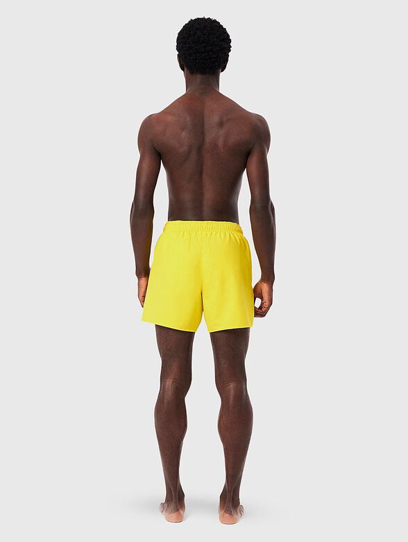 Yellow shorts with logo detail - 2