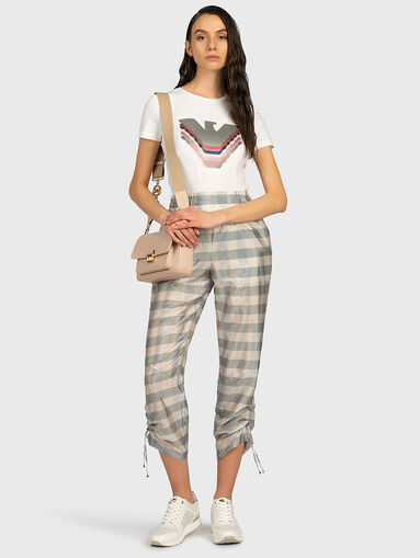 Pants with a checkered print - 4