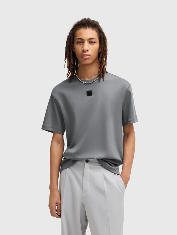 Cotton T-shirt with oval neckline in black - 1