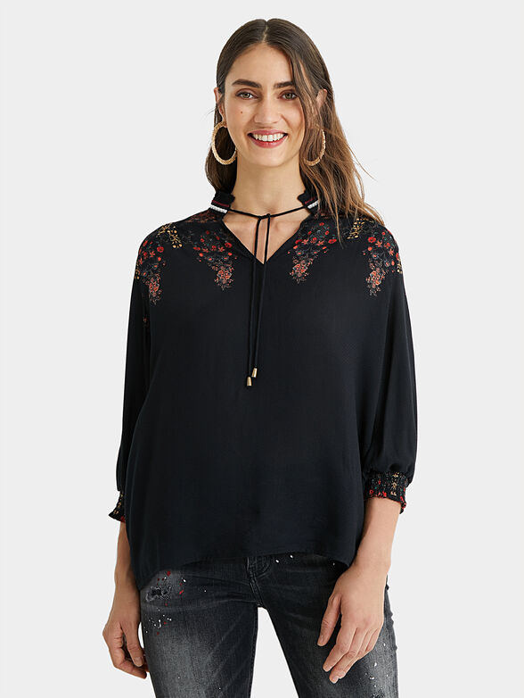 INDIRA Black blouse with floral print - 1