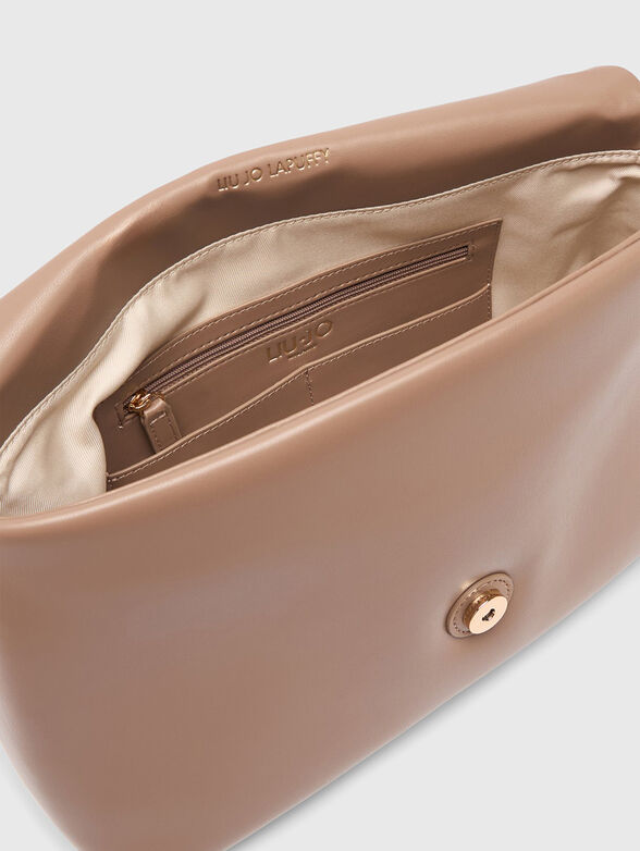 Crossbody bag with an accent handle - 6