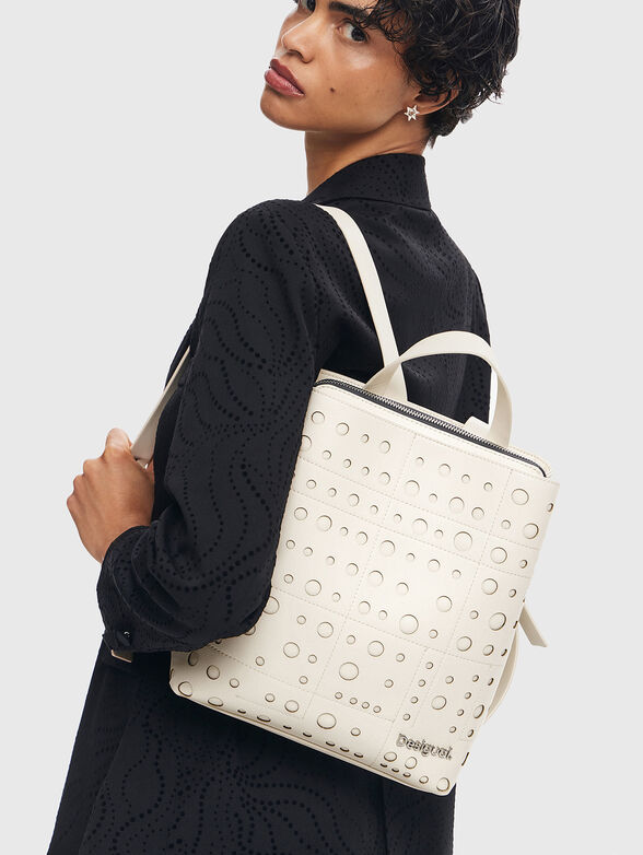 Backpack with perforations in black - 2