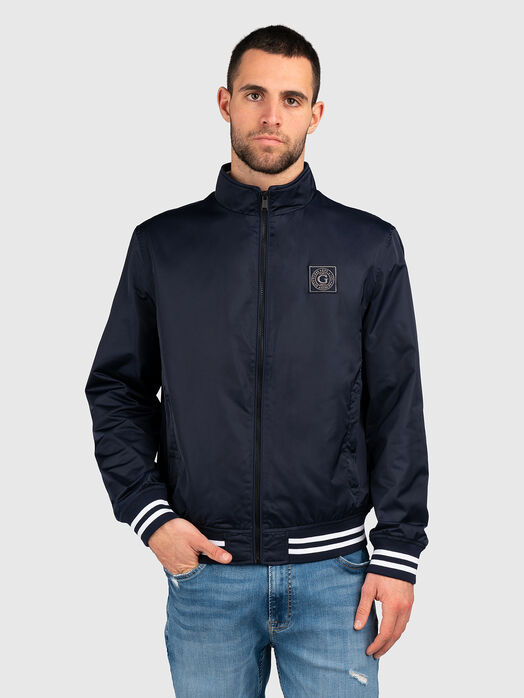 Blue jacket with zip and logo patch